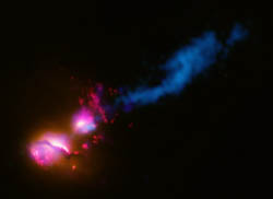 This composite image shows the jet from a black hole at the center of a galaxy striking the edge of another galaxy.