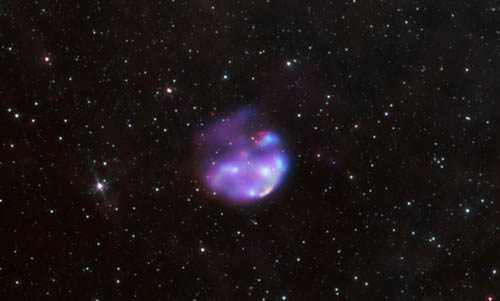This composite of supernova remnant G306.3 0.9 merges Chandra Xray observations, infrared data acquired by the Spitzer Space Telescope and radio observations from the Australia Telescope Compact Array.
