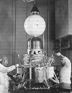 Technicians work on a Ranger Block 2 spacecraft