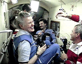 Astronaut Shannon Lucid welcomes the crew of Atlantis