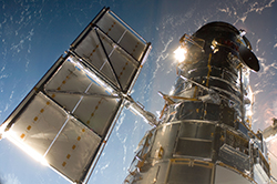 photo of the Hubble Space Telescope taken by astronauts during Servicing Mission 4