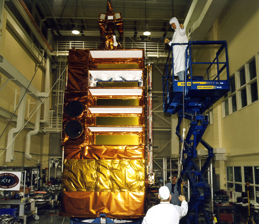 The Rossi X-ray Timing Explorer spacecraft undergoes pre-launch tests.