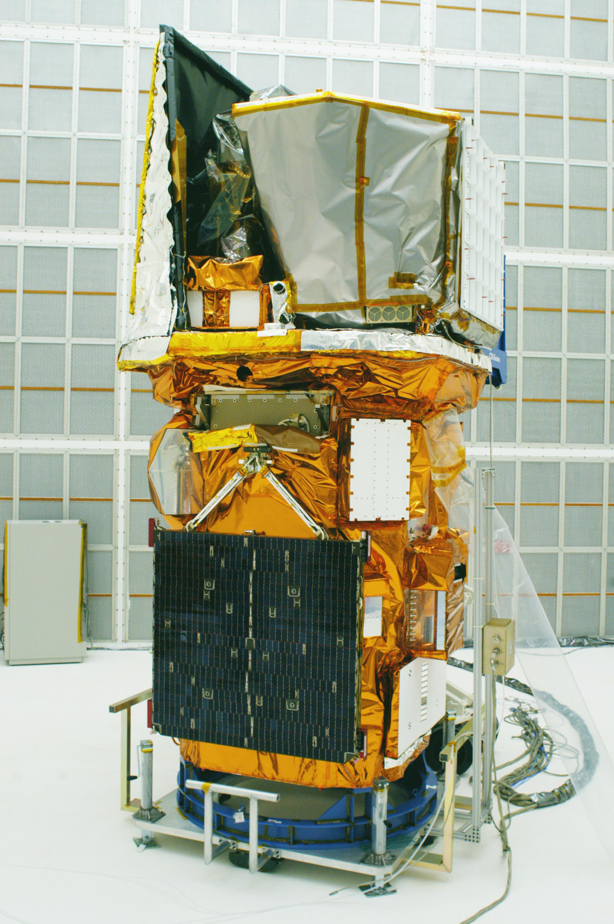 The Swift spacecraft in a hangar before launch.