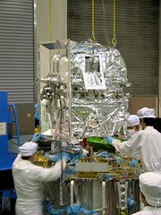 Installing XRS on the Suzaku spacecraft