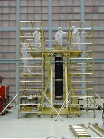 The XRT subsystem in the cleanroom with technicians preparing it for integration and testing